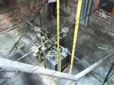 Sistema electro mecánico del reloj en la torre del campanario de la Catedral Nuestra Señora de Copacabana de Guarenas, octubre 2020.