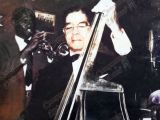 Benito Canónico ejecutando el contrabajo, década 1960. Fotografía cortesía de Yenny Padrón. Coloreada digitalmente por Campanario Urbano.