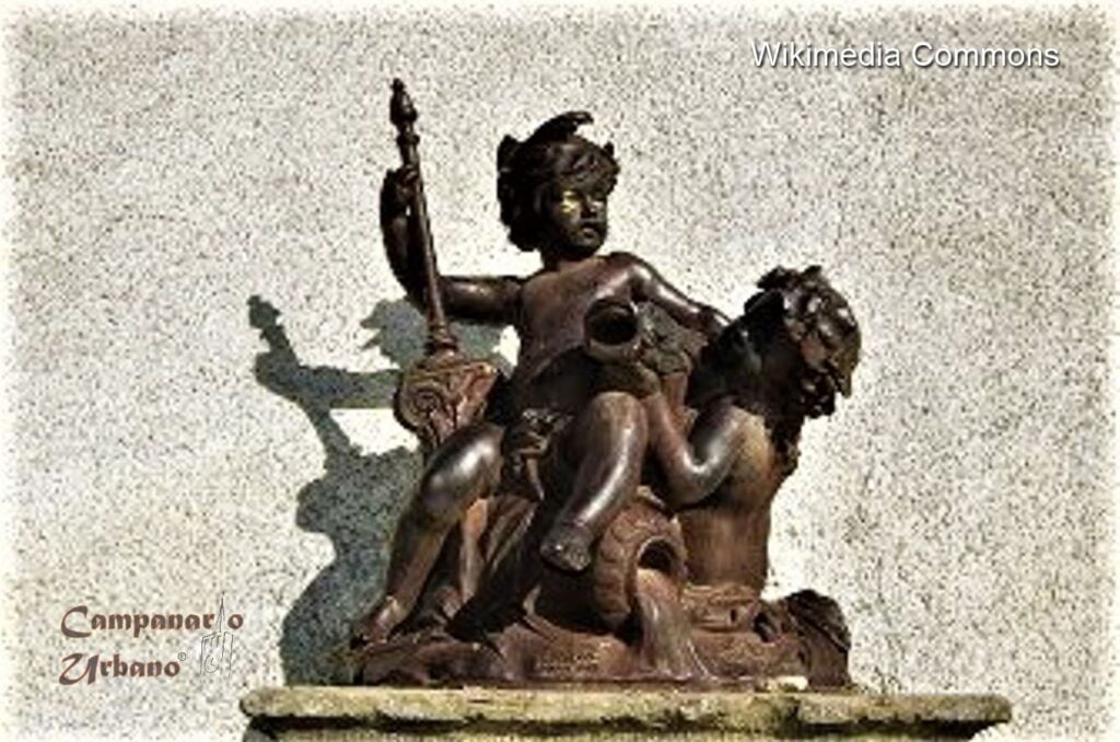 Fuente de Loporzano, Aragón, España, con escultura de amorcillos elaborada por Emile Antoine Durenne en 1889.