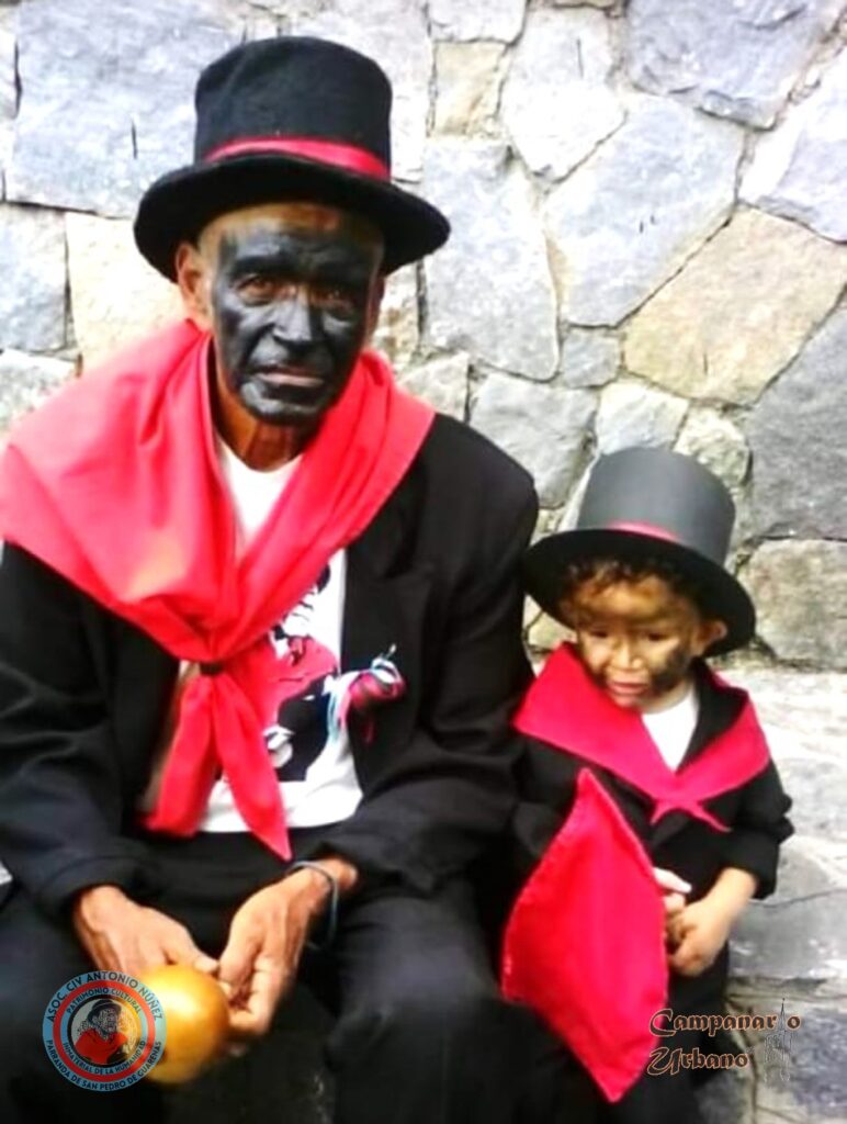 Sanpedreños de Guarenas, vistiendo pañuelo rojo que emula a la muceta papal del siglo XIX.
